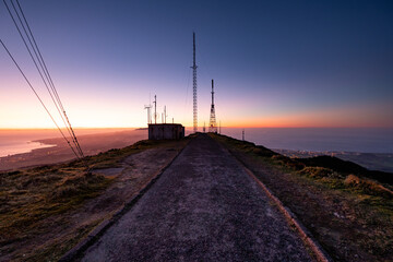 Wall Mural - Beautiful view from the top of Pico da Barrosa, at sunset overlooking the south and north coast of Sao Miguel Island in the Azores.