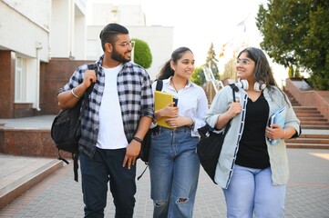 Wall Mural - Group of Indian or Asian college students in the campus