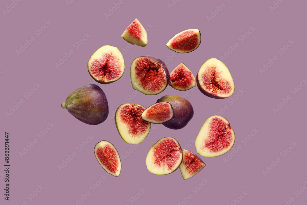 Fresh ripe figs on purple background