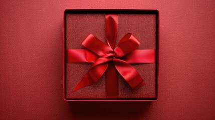 Wall Mural - Red gift box with matching ribbon viewed from above