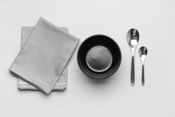 Wall Mural - Simple table setting with napkin on white background