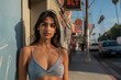© blvdone - Young sexy woman standing on a city street