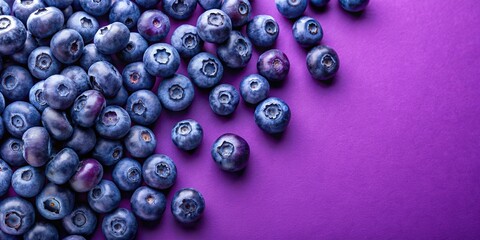 Wall Mural - Juicy blueberries scattered on a vibrant purple background, blueberries, purple, fruit, fresh, vibrant, colorful, organic