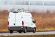 © AlexGo - Commercial work van driving with tools and ladder on the road