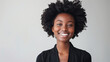 © Nordic Studio - Happy smiling black african woman with curly hair at isolated copy space blank background