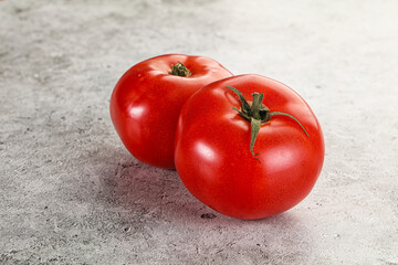 Two ripe sweet organic tomato