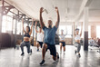 © peopleimages.com - Friends, training and lunge in group at gym for workout, core exercise or fitness together indoors. Diverse class, people or warm up for ab muscle, session and sport for health challenge in gymnasium
