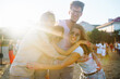 © maxbelchenko - Holi festival. Young people with colorful paint on clothes and bodies have fun together. Beach party. Friendship, rest, holidays.