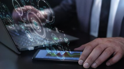 Wall Mural - engaging with a laptop and a 3d holographic display.
