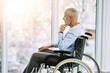 © Stratford/peopleimages.com - Man, wheelchair and thinking by window for memories, ideas and arthritis in rehabilitation. Paralysed, healthcare and male person in in nursing home, decision and mental health for cancer patient