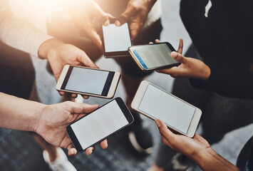 Wall Mural - Phone, mockup and hands of people in group for networking on social media, mobile app or internet. Technology, contact and friends in circle with cellphone for connectivity or notification on screen.