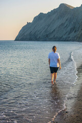 Wall Mural - Girl by the sea