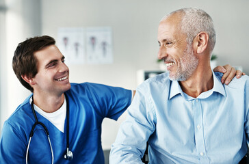 Canvas Print - Senior, man and nursing with patient in clinic, care and together for wellness consultation with medical employee. Support, healthcare and medicine help with smile or happy people, hospital and trust