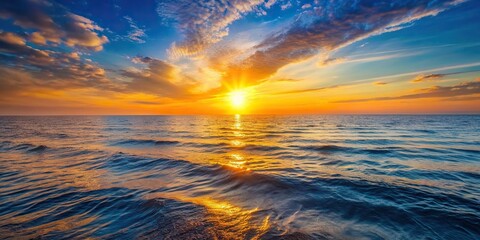 Wall Mural - Breathtaking view of the ocean at sunrise, with the sun rising over the horizon, casting a warm glow on the water and sky , sunrise, ocean