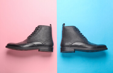 Wall Mural - Stylish black leather men's brogue boots on pink blue background. Top view. Flat lay