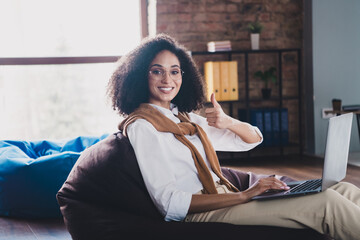 Wall Mural - Photo of nice successful business woman sit bag laptop thumb up wear white shirt modern office indoors