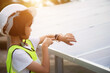 © chaunpis - Young girl touching solar panel.