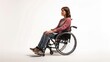 © WITTAYA  ANGMUJCHA - Beautiful disabled American woman sitting in a wheelchair with full white background