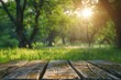 © Mamstock - Spring summer beautiful nature background with blurred park trees in sunlight and empty wooden table.