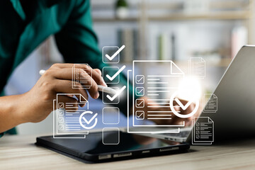 Canvas Print - Business performance monitoring and evaluation concept, Take an assessment, Business man using laptop and tablet online checklist survey, Filling out digital checklist, Questionnaire with checkboxes.