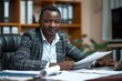 © Chanagun - Propose me an image of an African entrepreneur in his office with company documents on the table A large firm