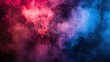 © tashechka - Abstract red and blue smoke clouds swirling together on a dark background, creating a vibrant and dynamic visual effect.