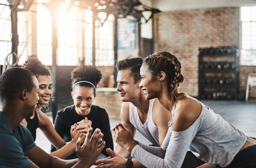 Canvas Print - Class, fitness and squat in group at gym for workout, core exercise or training together indoors. Diverse people, friends and warm up for ab muscle, session or sport for health challenge in gymnasium