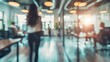 © Bijac - blurred business office with casually dressed people bokeh background modern workplace