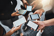 © peopleimages.com - Phone, mockup and hands of people in circle for networking on social media, mobile app or internet. Technology, contact and friends in group with cellphone for connectivity or notification on screen.