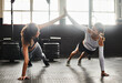 © peopleimages.com - Fitness, high five and push up with women on gym floor for power, strength training or workout. Exercise, smile and wellness with happy friends in health or sports center for motivation and support