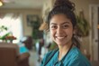 © Vorda Berge - Young Hispanic nurse wearing scrubs in a nursing home
