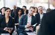 © peopleimages.com - Business, people and taking notes in conference at office for seminar, instruction and learning. Corporate, employees and workshop or convention as audience for information, knowledge or career