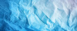 © alexandre - Light blue crumpled paper texture background displaying the intricate folds and creases of the material,