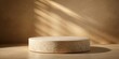 © Woonsen - Round stone textured pedestal with natural soft shadow for product presentation on beige background, stone, pedestal, podium