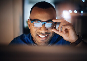 Poster - Face, black man and home office with glasses on computer for remote work as IT specialist, consultant and freelancer. Employee, business and smile or reading on internet for website design research