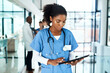 © peopleimages.com - Medical, woman and nurse with tablet in hospital healthcare, Telehealth and research for diagnosis. Female doctor, digital and reading, information history and surgery planning at clinic for health