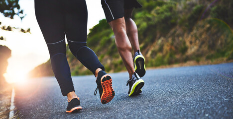 Poster - Fitness, legs and people running in road for outdoor race or marathon training in mountain. Sports, friends and feet of athletes with cardio workout for endurance exercise in street for wellness.