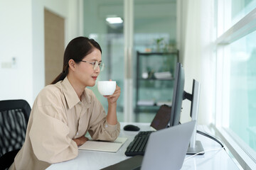 Wall Mural - Asian woman working from home, Remote work