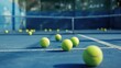 © Mamstock - Hard blue court with tennis balls copy space image
