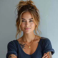 Wall Mural - A beautiful woman with tattoos and a blue shirt.
