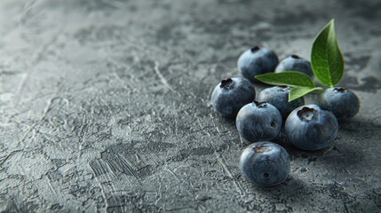Wall Mural - blueberry on a gray background top view. Selective focus