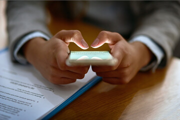 Canvas Print - Person, hands and typing with phone screen at night for communication, research or reading news at office. Closeup of employee scrolling or online browsing on mobile smartphone for web search or app