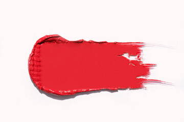 Wall Mural - Red lipstick glossy texture, smear stroke isolated on white background. Cosmetic product swatch