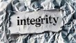 © Nicolas Swimmer - the word integrity on a white paper background