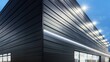 © Aeman - ultra-modern retail space with an exterior clad entirely in matte black aluminum siding, under bright lights