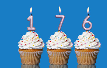 Birthday Cupcakes With Candles Lit Forming The Number 176