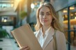 © Alexandr - Woman holding folder
