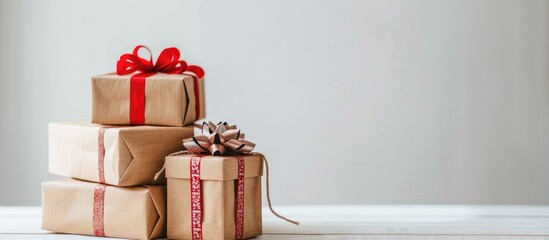 Sticker - Gift boxes placed on a table with a white background, creating a neat display with copy space image.