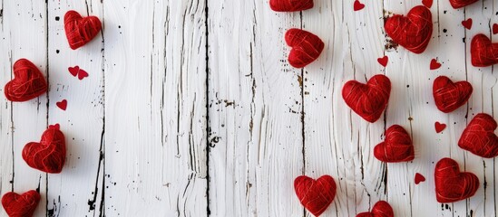 Sticker - Valentine's Day theme displayed on a white wooden backdrop with red heart decorations on a copy space image.