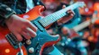 © evgenia_lo - Person playing an electric guitar in a music store, fingers on fretboard, vibrant lighting.